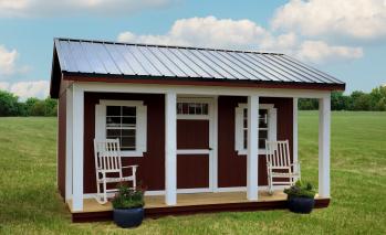Red Signature Appalachian Cabin with white trim.